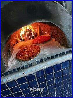 Stone baked pizza? Wood fired great tasting pizza. Also does bread and meat